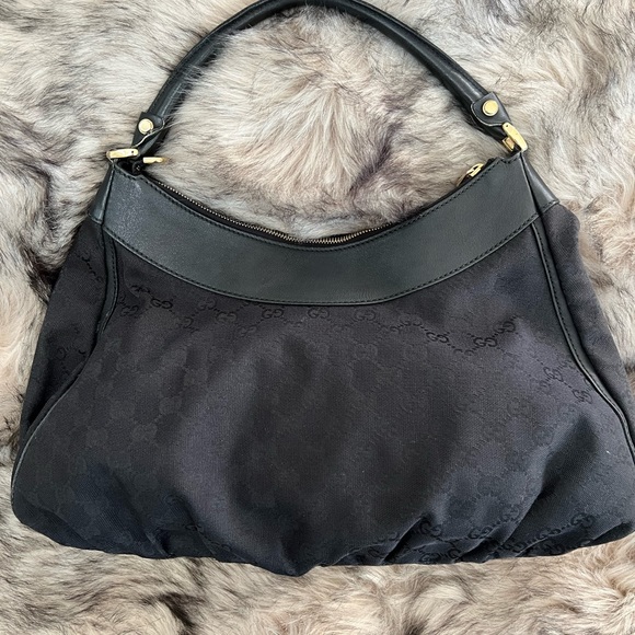 Gucci black canvas monogram hobo bag with gold buckle. Comes with a duster bag. - Picture 2 of 12